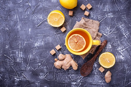 Hot tea with lemon and ginger. Top viewの写真素材