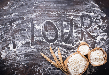 Flour and dry wheat ears. Top viewの写真素材