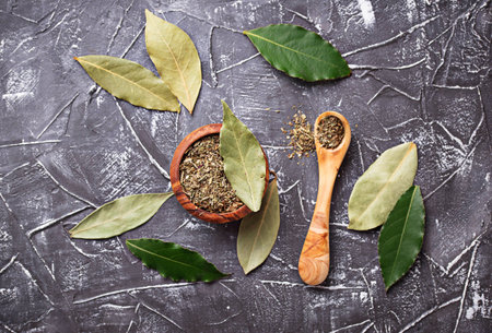 Fresh, ground and dried bay leaf. Top view