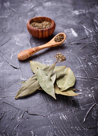 Fresh, ground and dried bay leaf. Selective focusの写真素材