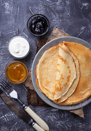 Pancakes crepes with different jam and cream. Top viewの写真素材