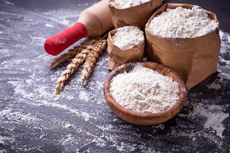 Wheat flour, ears and rolling pin. Top viewの写真素材