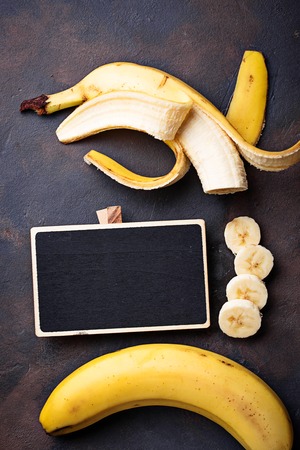 Fresh sliced banana on dark backgroundの写真素材