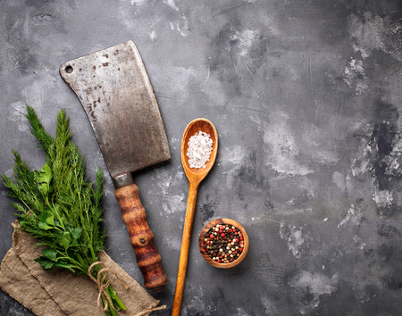 Butchers vintage cleaver with spicesの写真素材