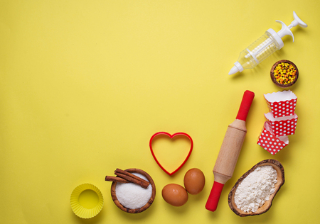 Ingredients for baking  on yellow backgroundの写真素材
