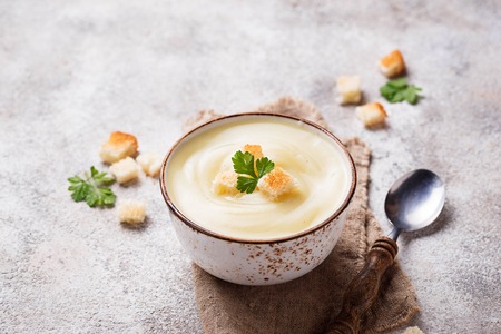 Cream soup with cauliflower and croutonの写真素材