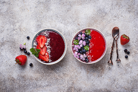 Smoothie bowls with strawberry and blueberryの写真素材