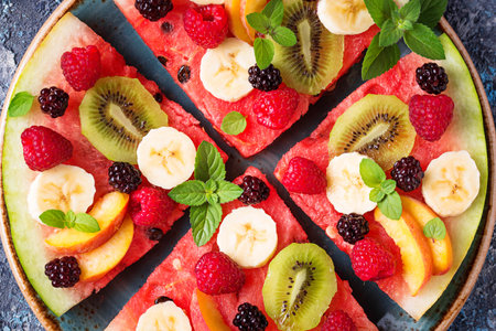 Watermelon pizza with fruit and berries. Healthy summer dessert