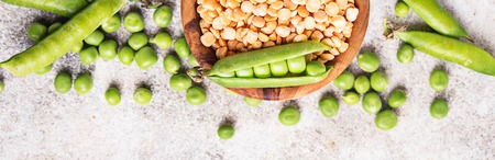 Fresh and dry peas on light background. Selective focus, banner for siteの写真素材
