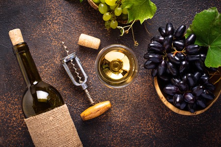 Grape, wine and vintage corkscrewの写真素材