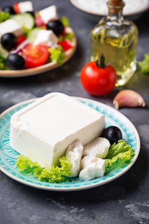 Fresh feta cheese with olivesの写真素材