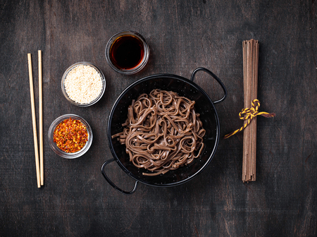 Asian noodles soba with various dressingの写真素材