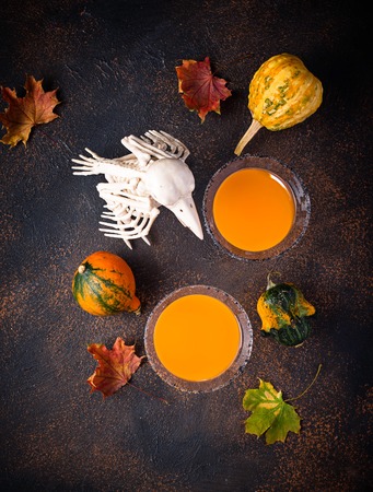 Halloweens pumpkin martini cocktail. Drink for partyの写真素材