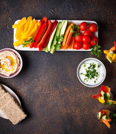 Healthy snacks. Vegetables and hummusの写真素材