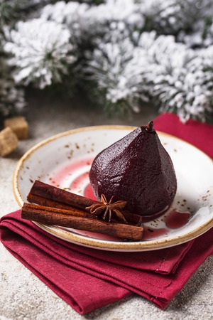 Pears in wine with spicesの写真素材
