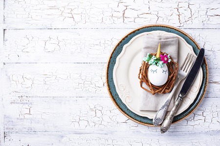 Easter table setting with quail eggsの写真素材