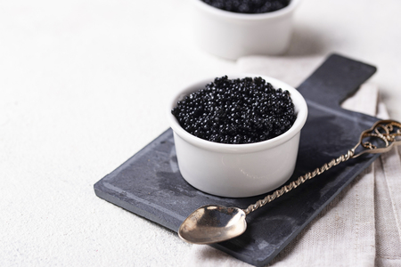 Sturgeon black caviar in bowlsの写真素材
