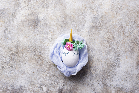 Eggs in shape of unicorn. Easter backgroundの写真素材