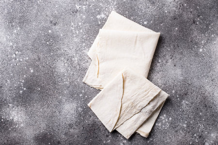 Armenian flat bread lavash on table. Top view