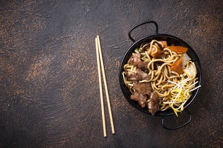 Asian noodles with meat, vegetables and soybean sproutsの写真素材