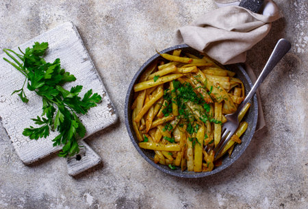 Stewed yellow wax beans in pan