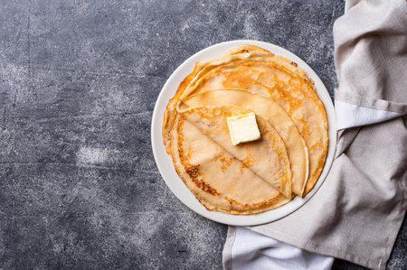 Pancakes crepes on dark background