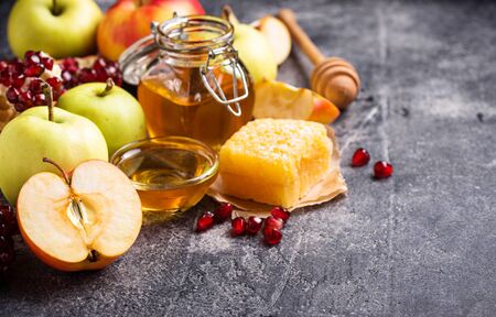 Honey, apple and pomegranate for Rosh Hashanaの写真素材