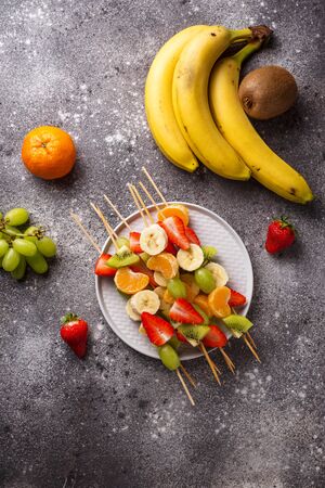 Fruit skewers, healthy summer snack for partyの写真素材