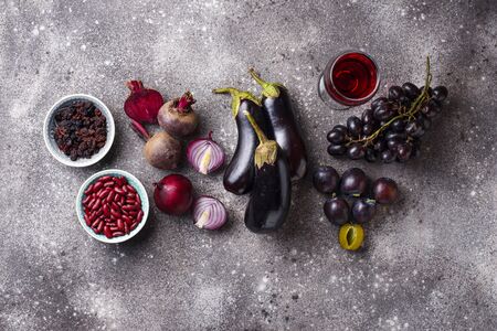 Collection of purple food. Fruits, vegetables, beans and wineの写真素材