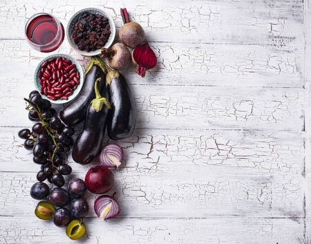 Collection of purple food. Fruits, vegetables, beans and wineの写真素材