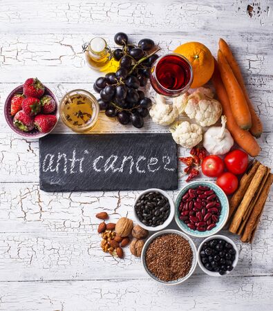 Cancer fighting products. Food for healthy life. Fruits, vegetables, beans, green tea and red wineの写真素材