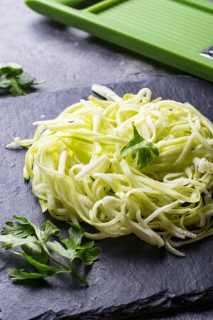 Raw green uncooked zucchini pastaの写真素材