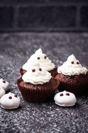 Cupcake in shape of ghost. Halloween treat for children partyの写真素材