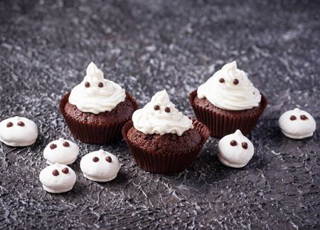 Cupcake in shape of ghost. Halloween treat for children partyの写真素材