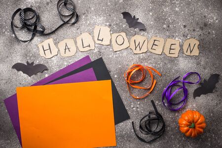 Purple, orange and black paper and ribbon for Halloween DIYの写真素材