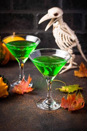 Halloweens spooky drink green martini cocktailの写真素材