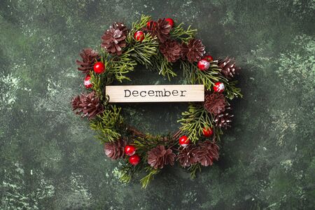 Christmas green background with wreathの写真素材
