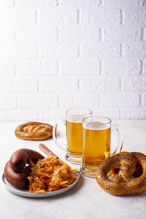 Beer, pretzels, sausages and stewed sauerkrautの写真素材