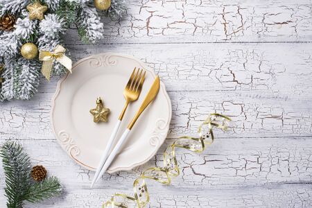 Christmas table setting and golden decor. Top viewの写真素材
