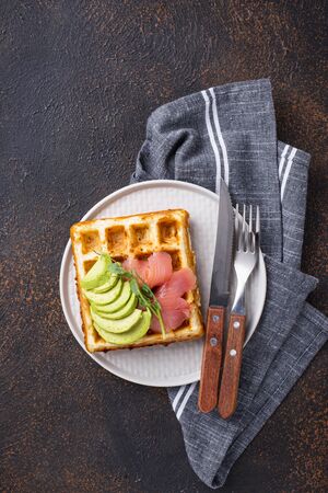 Keto cheese waffle with avocadoの写真素材