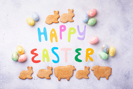 Happy Easter text and color eggs