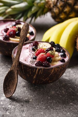 Acai bowl in coconut plate.の写真素材