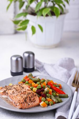 Baked salmon with vegetable. Healthy lunch or dinnerの写真素材