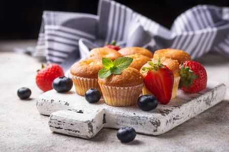 Summer mini cupcakes with berryの写真素材