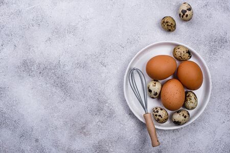 Chicken and quail eggs with whiskの写真素材