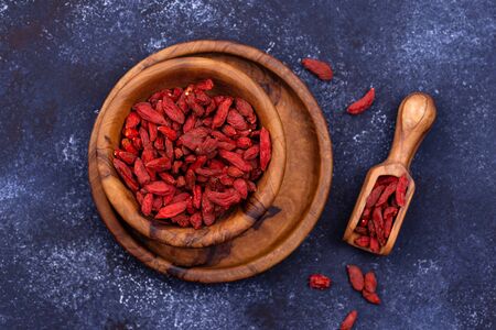 Goji berries on blue backgroundの写真素材