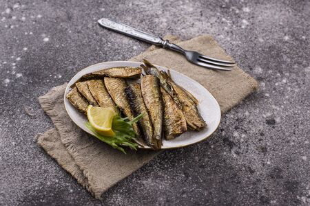 Canned smoked sprats in oilの写真素材