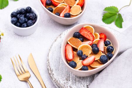 Sweet pancake cereals with berriesの写真素材