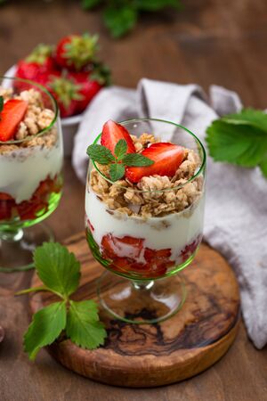 Dessert with strawberry, yogurt and granolaの写真素材