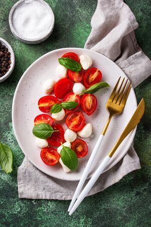 Caprese salad with tomatoes and mozzarellaの写真素材